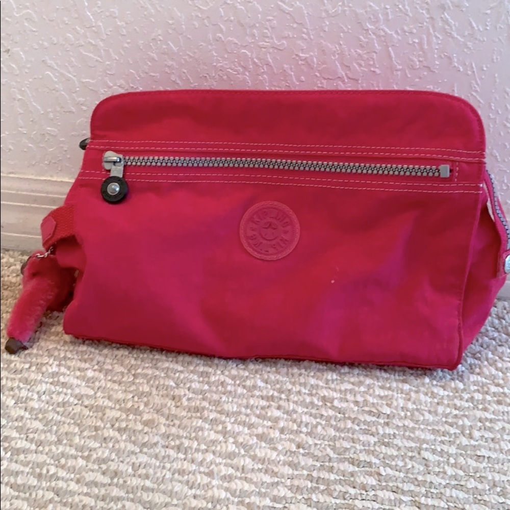 Hot pink Kipling travel/toiletries bag